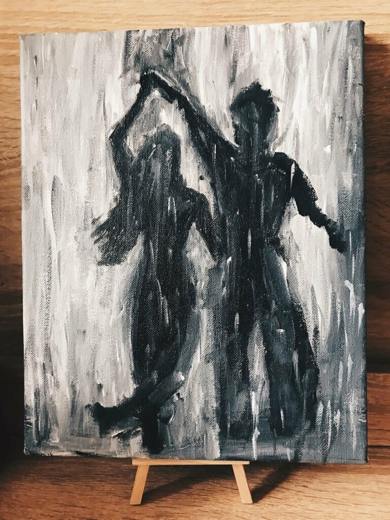 Couple dansant, peint en noir et blanc