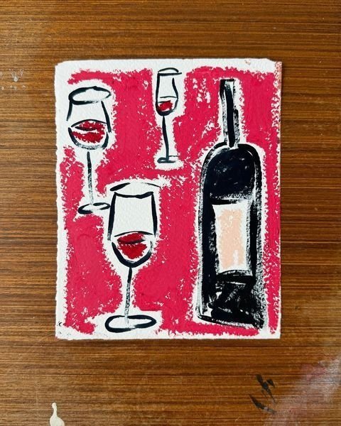 Bouteille et verres de vin rouge sur une petite toile