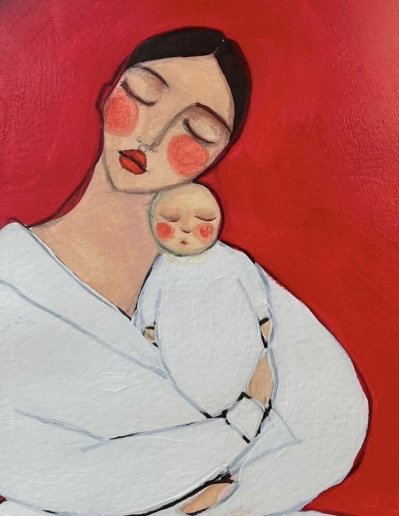 Mère tenant son bébé, sur fond rouge